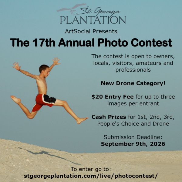 Boy in bathing suit jumping on the sand with blue sky. 17th Annual Photo Contest