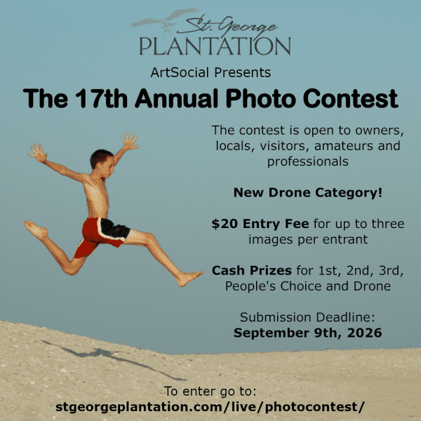 Boy in bathing suit jumping on the sand with blue sky. 17th Annual Photo Contest